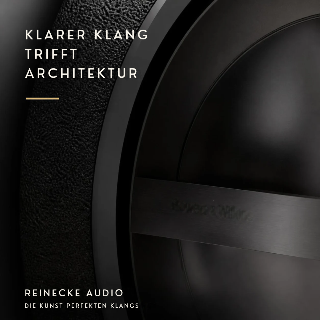 Detailaufnahme eines hochwertigen schwarzen Lautsprechers mit edler Metalloberfläche und minimalistischer Formgebung. Close-up of a premium black loudspeaker with refined metal detailing and minimalist design.